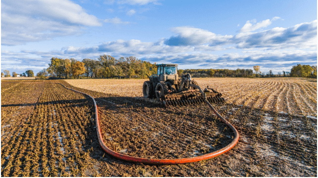 Close Up TPU Drag Hose In Stubble Field